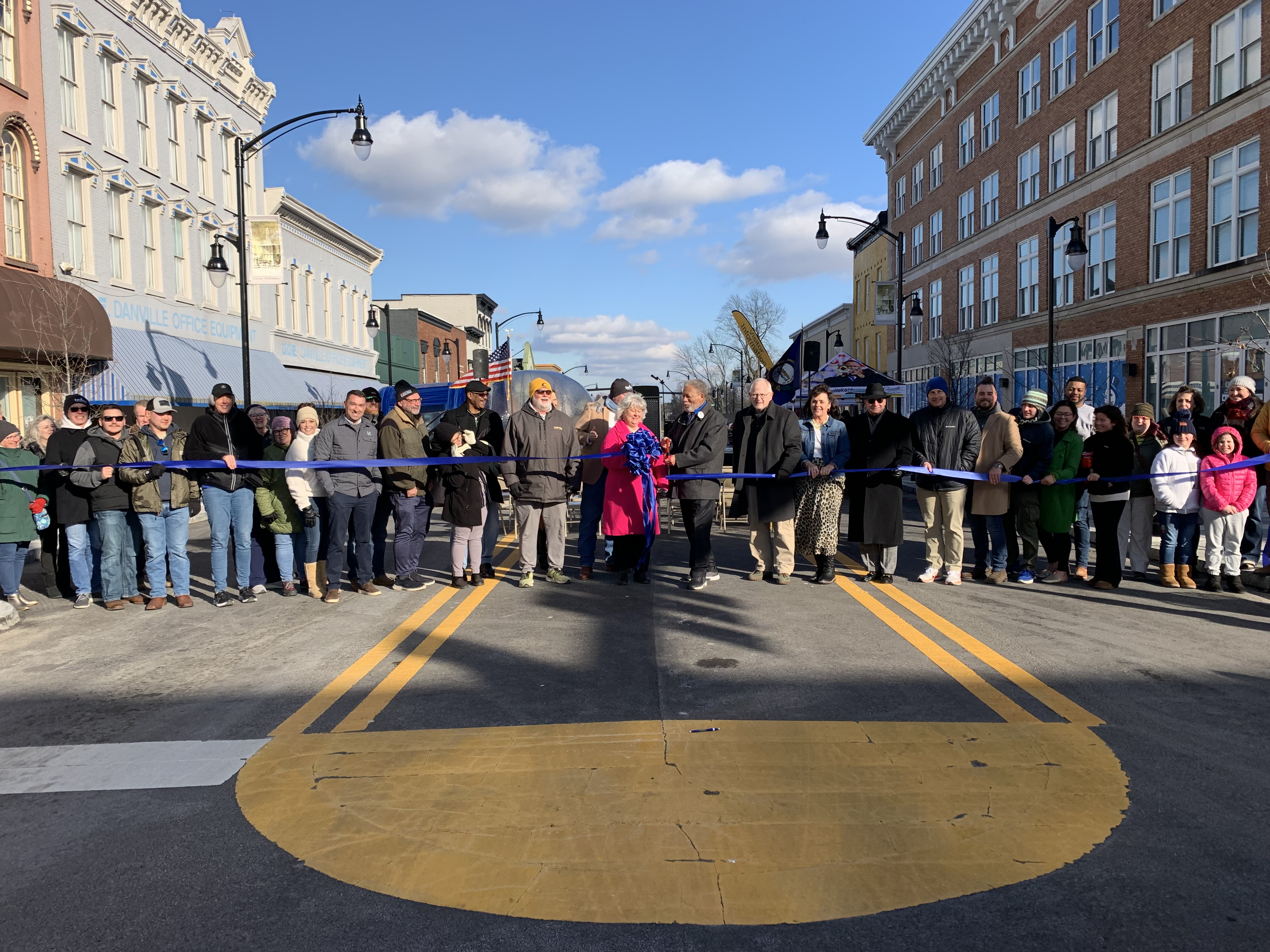 City officials perform a ribbon cutting ceremony on Main Street in Danville after embracing the complete streets concept