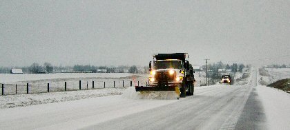 Snow plows on the road in Bath County