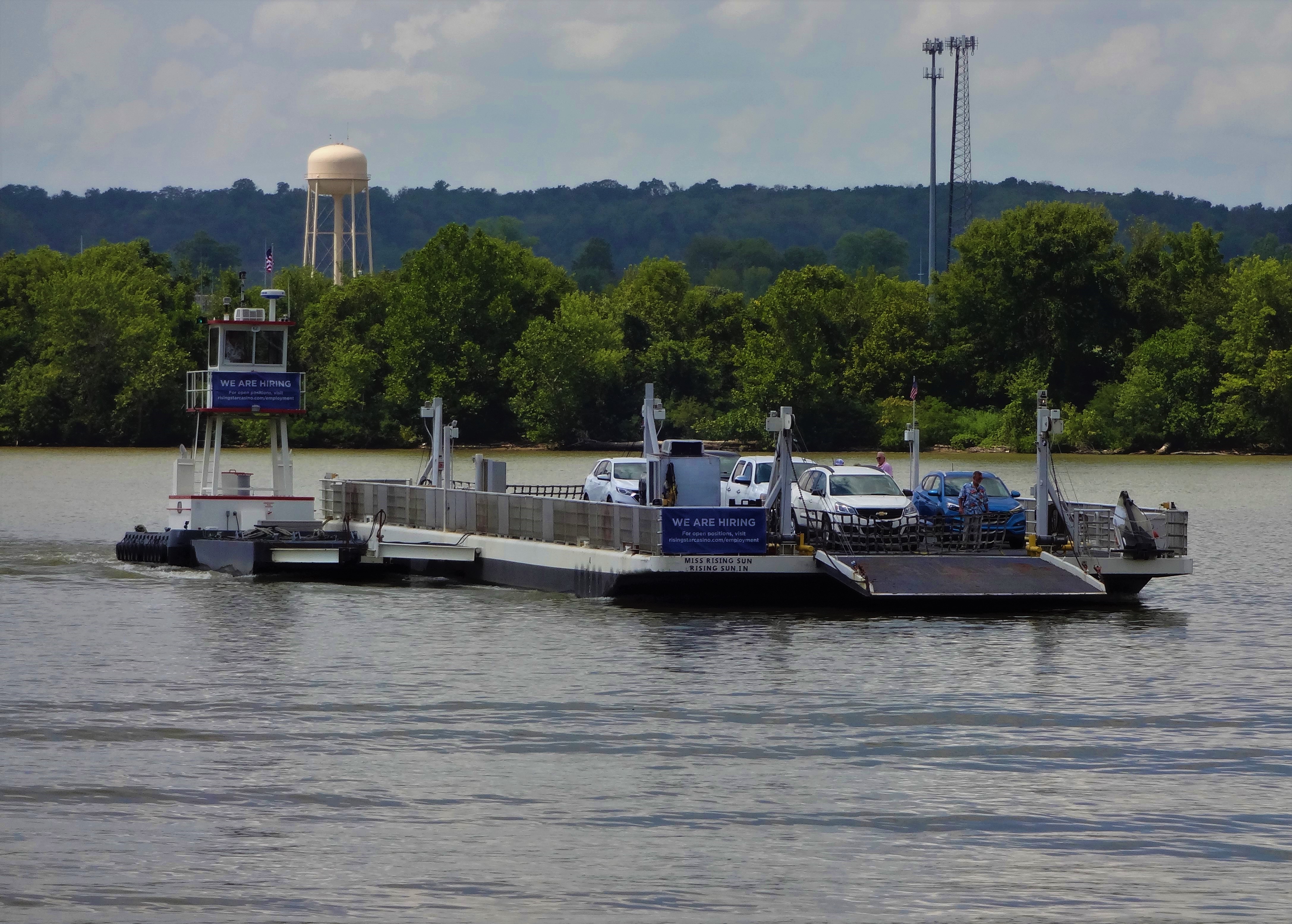 Rising Star Ferryboat ferrying vehicles across the Ohio River